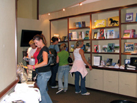 People browsing the Lendon F. Grey bookstore